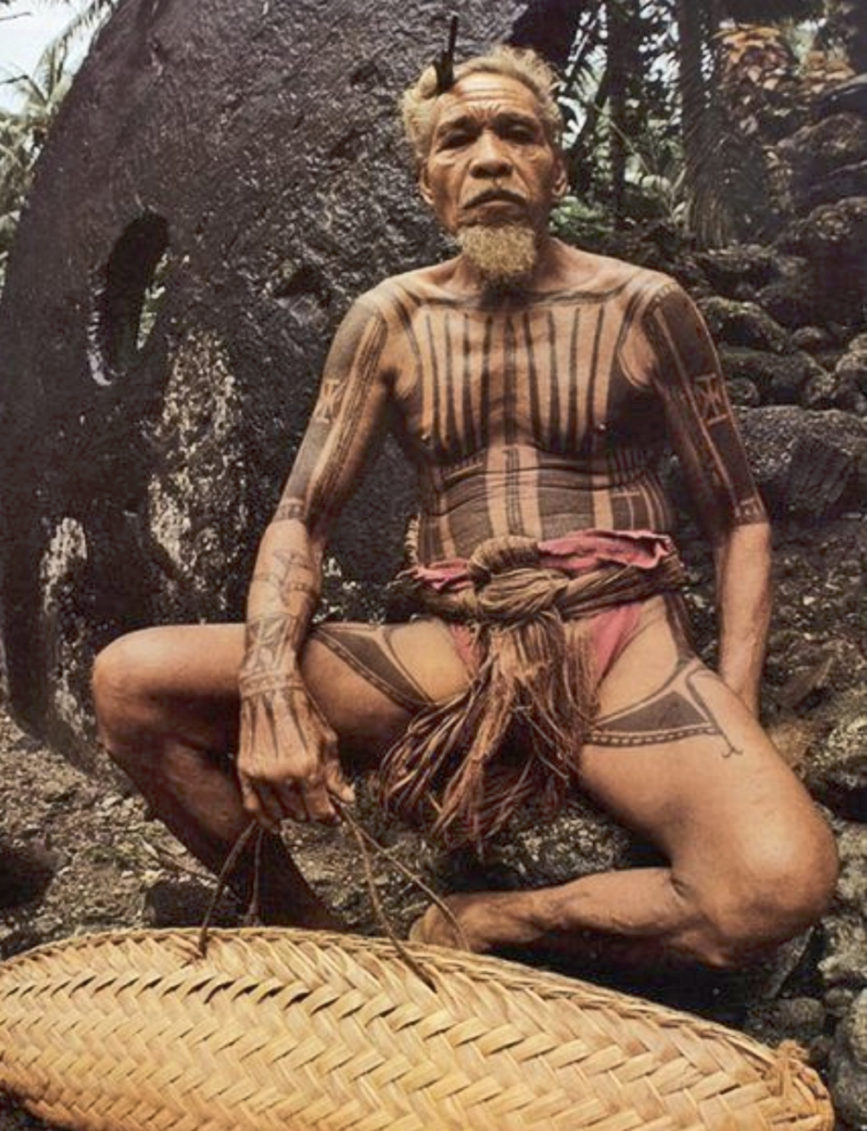 Dapoy wearing high-ranking Yapese full-body tattoo
